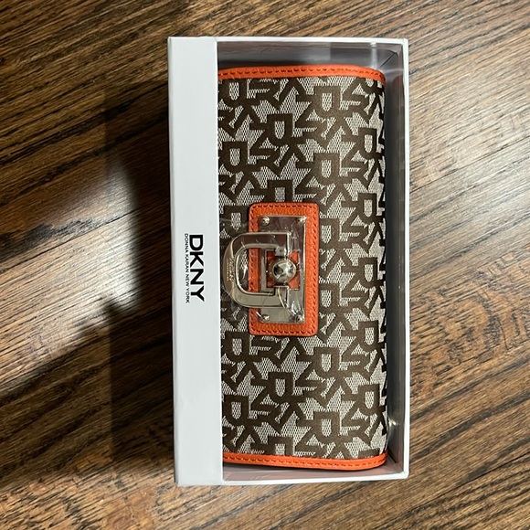 DKNYC Handbags - DKNYC wallet NWT orange color